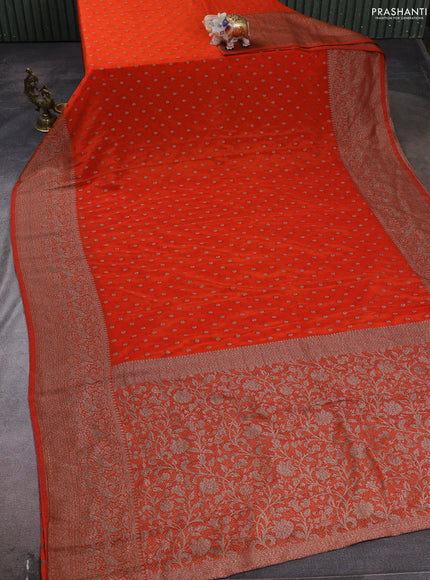 Banarasi semi crepe saree orange with woven buttas and woven border
