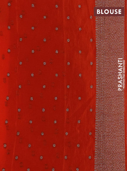 Banarasi semi crepe saree orange with woven buttas and woven border