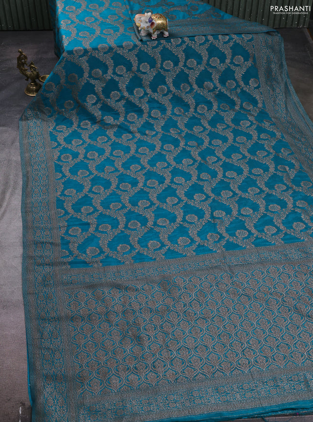 Banarasi semi crepe saree teal blue with allover thread & zari weaves and woven border