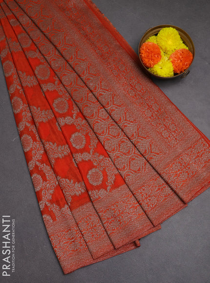Banarasi semi crepe saree orange with allover thread & zari weaves and woven border