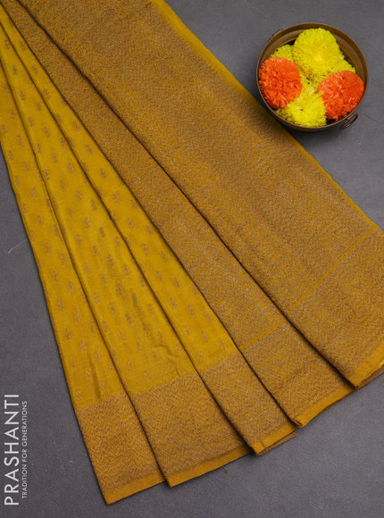 Banarasi semi crepe saree yellow with allover woven buttas and woven border