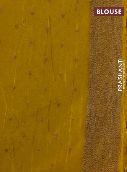 Banarasi semi crepe saree yellow with allover woven buttas and woven border