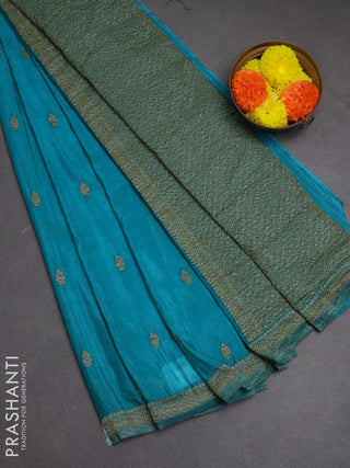 Banarasi semi crepe saree teal blue with woven buttas and woven border