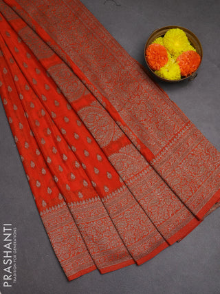 Banarasi semi crepe saree orange with woven buttas and woven border