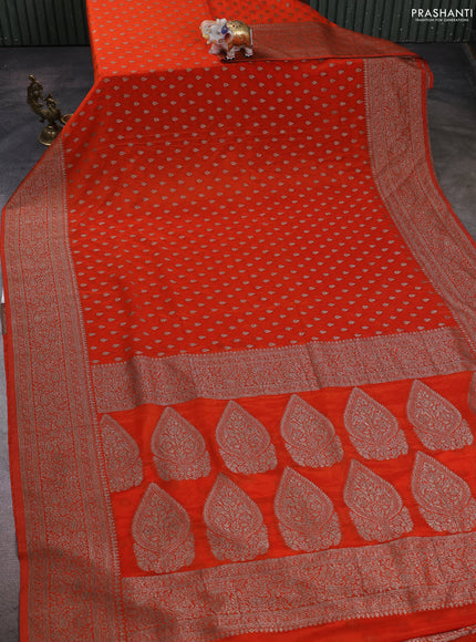 Banarasi semi crepe saree orange with woven buttas and woven border
