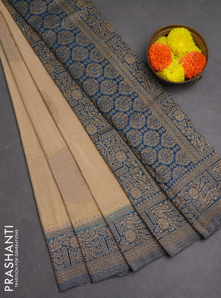 Banarasi semi crepe saree beige and cs blue with woven buttas and woven border