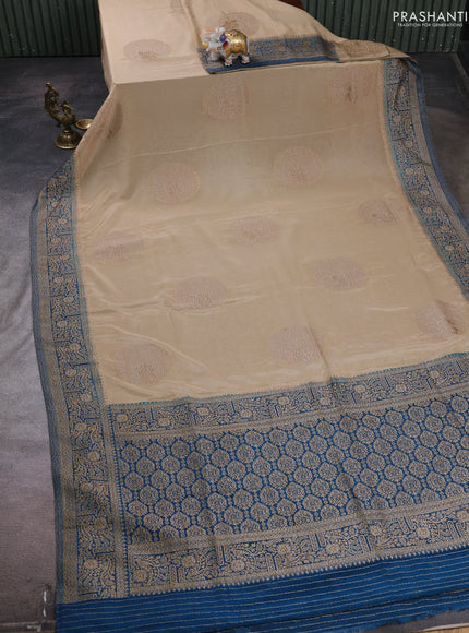 Banarasi semi crepe saree beige and cs blue with woven buttas and woven border