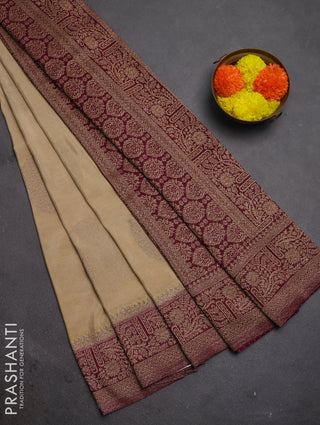 Banarasi semi crepe saree beige and purple with woven buttas and woven border