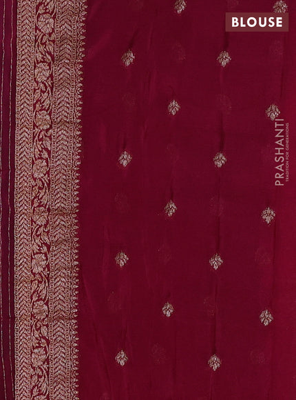 Banarasi semi crepe saree teal blue and maroon with allover woven buttas and woven border