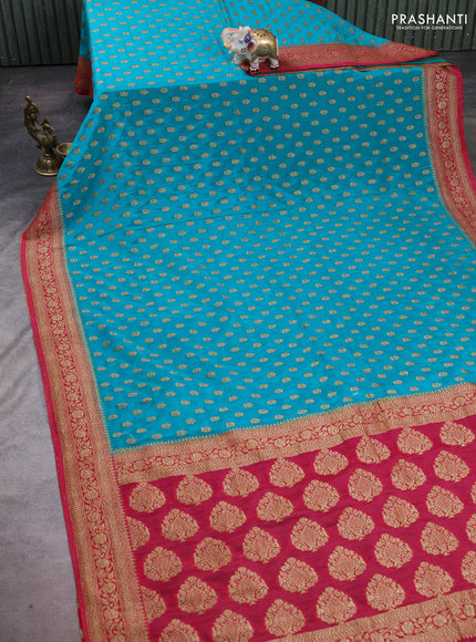 Banarasi semi crepe saree teal blue and dark pink with allover woven buttas and woven border
