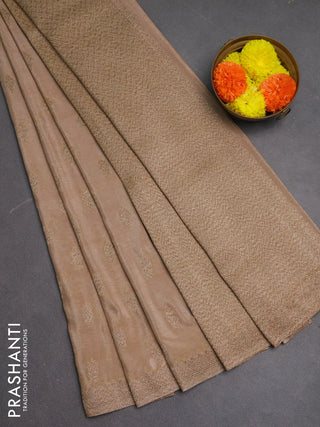 Banarasi semi crepe saree beige with allover woven buttas and woven border