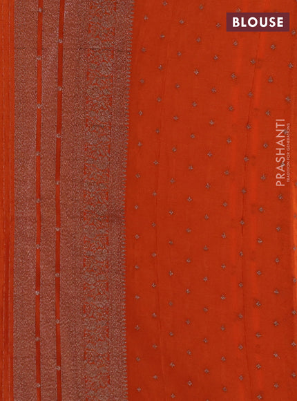 Banarasi semi crepe saree deep wine and orange with allover thread & zari weaves and woven border