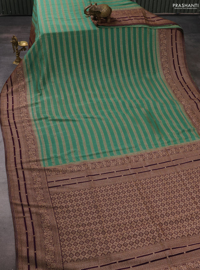 Banarasi semi crepe saree pastel green and deep violet with allover thread & zari weaves and woven border
