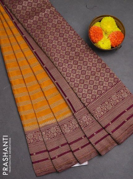Banarasi semi crepe saree mango yellow and deep purple with allover thread & zari weaves and woven border