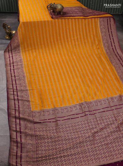 Banarasi semi crepe saree mango yellow and deep purple with allover thread & zari weaves and woven border