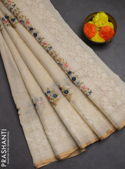 Linen cotton saree cream with embroidery buttas and embroidery pallu