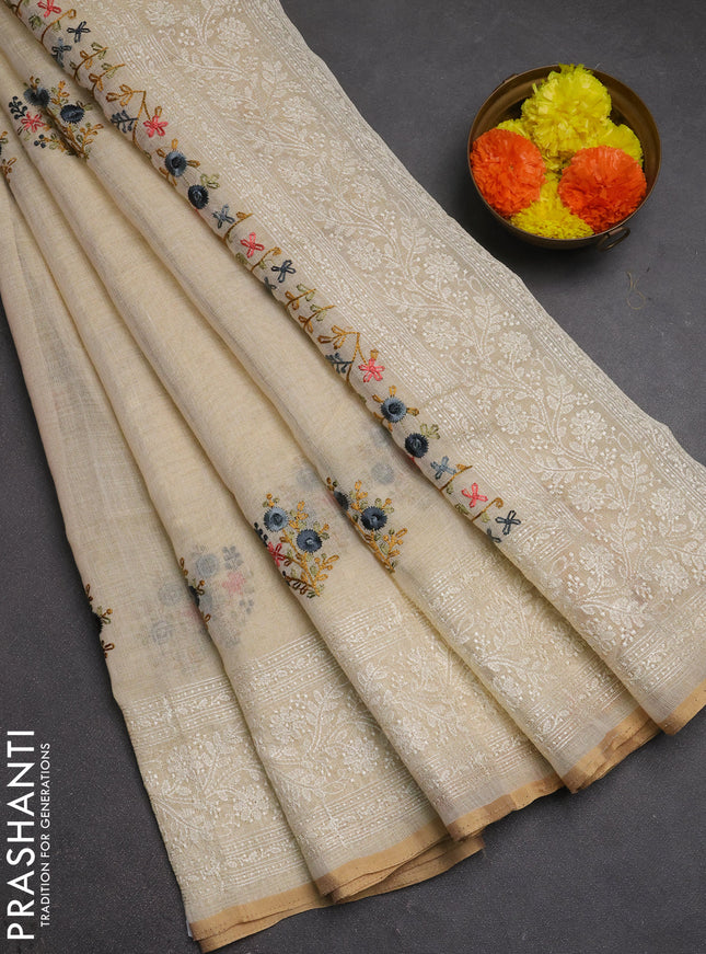 Linen cotton saree cream with embroidery buttas and embroidery pallu