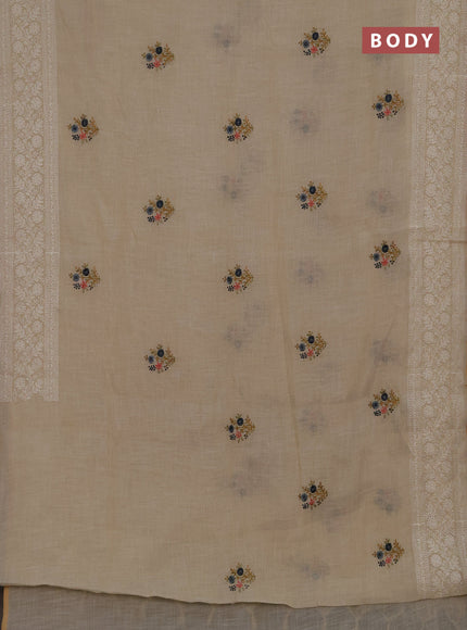 Linen cotton saree cream with embroidery buttas and embroidery pallu