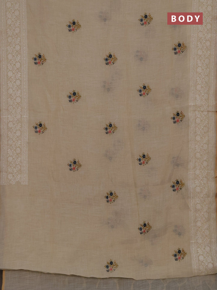Linen cotton saree cream with embroidery buttas and embroidery pallu
