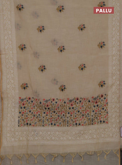 Linen cotton saree cream with embroidery buttas and embroidery pallu