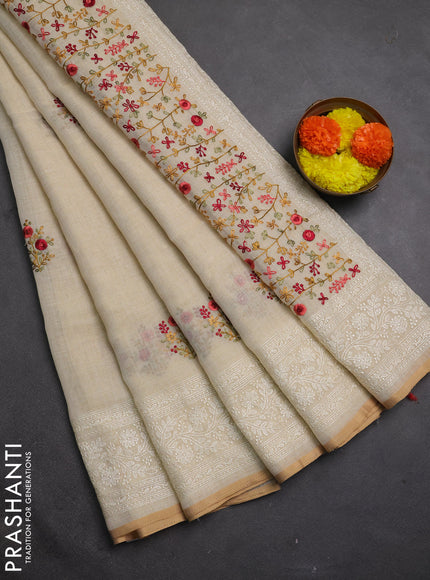 Linen cotton saree cream with embroidery buttas and embroidery pallu