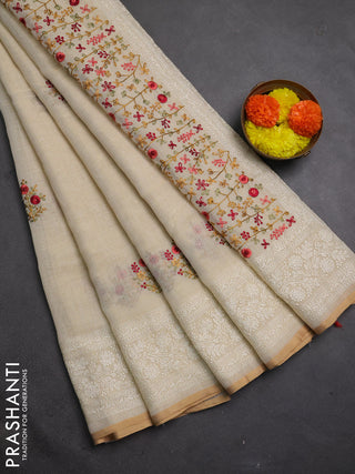 Linen cotton saree cream with embroidery buttas and embroidery pallu