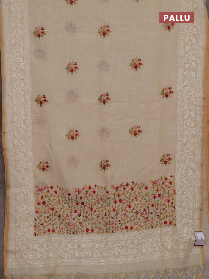 Linen cotton saree cream with embroidery buttas and embroidery pallu