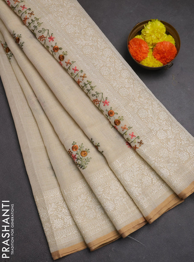 Linen cotton saree cream with embroidery buttas and embroidery pallu