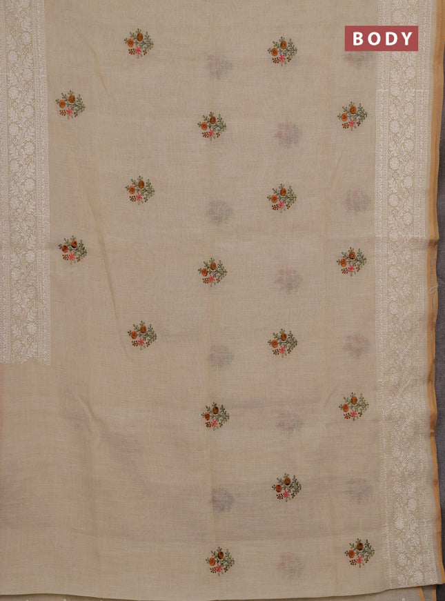 Linen cotton saree cream with embroidery buttas and embroidery pallu