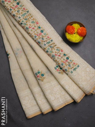 Linen cotton saree cream with embroidery buttas and embroidery pallu