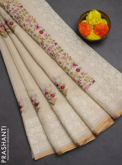 Linen cotton saree cream with embroidery buttas and embroidery pallu