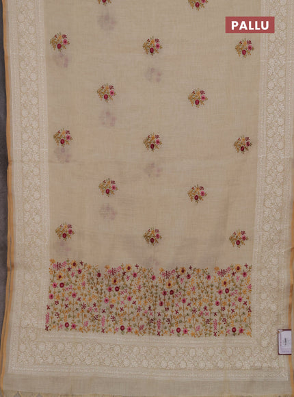 Linen cotton saree cream with embroidery buttas and embroidery pallu