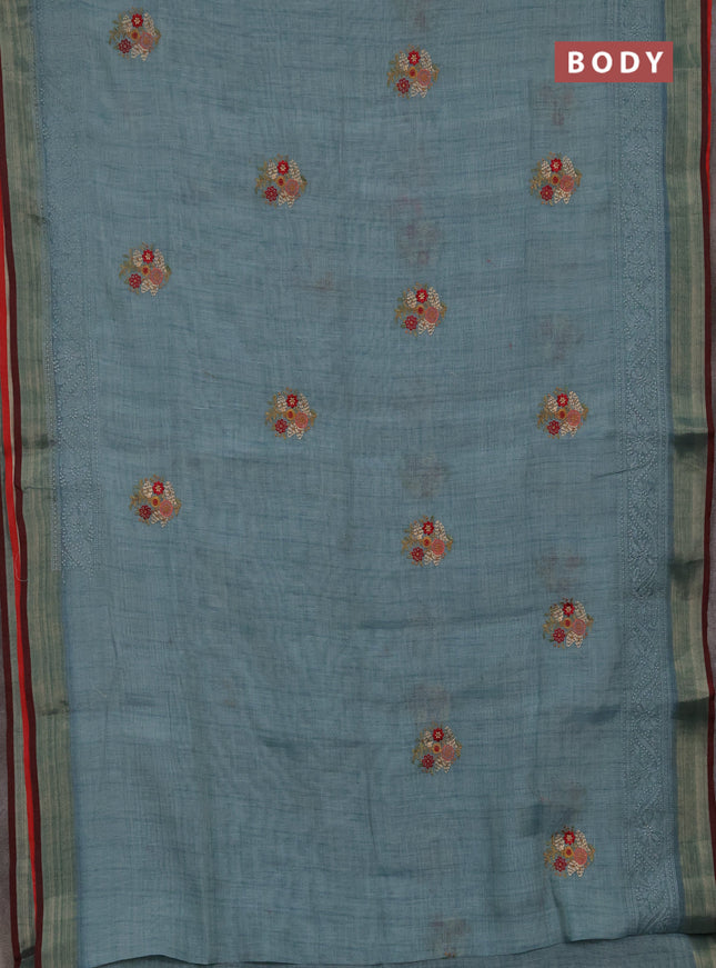 Tissue linen cotton saree teal blue with embroidery buttas and embroidery pallu