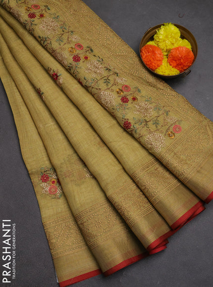 Tissue linen cotton saree pale yellow with embroidery buttas and embroidery pallu