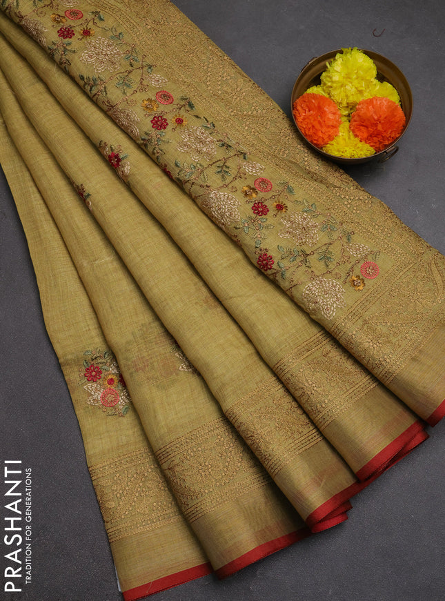 Tissue linen cotton saree pale yellow with embroidery buttas and embroidery pallu