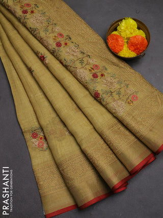 Tissue linen cotton saree pale yellow with embroidery buttas and embroidery pallu