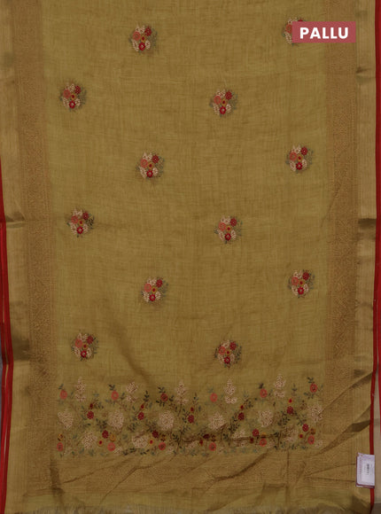 Tissue linen cotton saree pale yellow with embroidery buttas and embroidery pallu