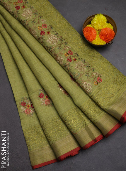 Tissue linen cotton saree light green with embroidery buttas and embroidery pallu