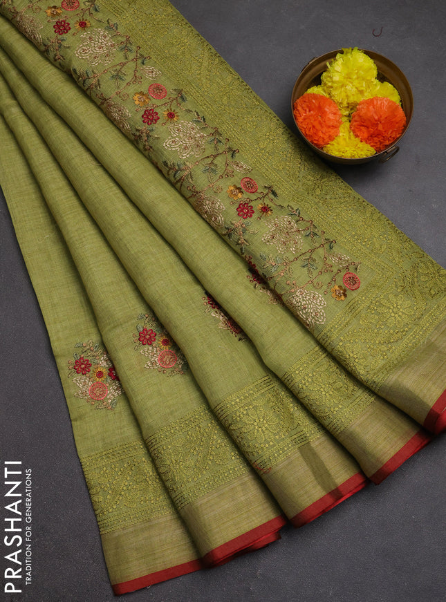 Tissue linen cotton saree light green with embroidery buttas and embroidery pallu