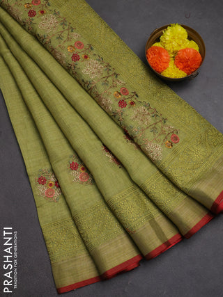 Tissue linen cotton saree light green with embroidery buttas and embroidery pallu