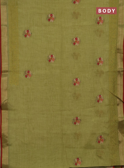 Tissue linen cotton saree light green with embroidery buttas and embroidery pallu