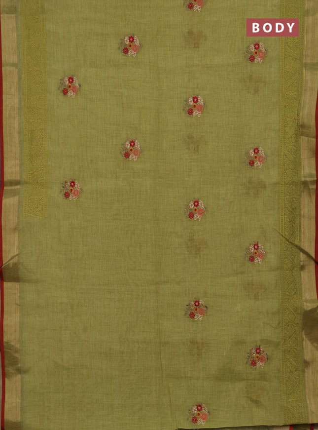 Tissue linen cotton saree light green with embroidery buttas and embroidery pallu