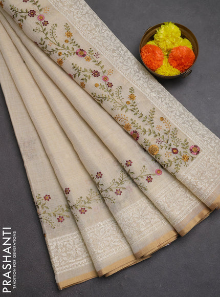 Linen cotton saree cream with embroidery buttas and embroidery border