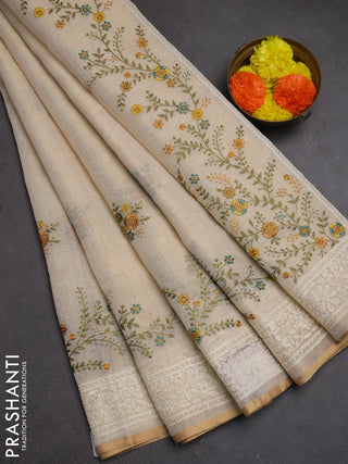 Linen cotton saree cream and yellow with embroidery buttas and embroidery border