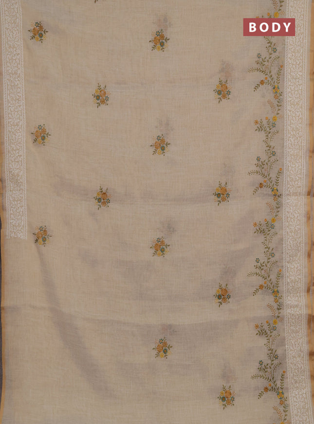 Linen cotton saree cream and yellow with embroidery buttas and embroidery border