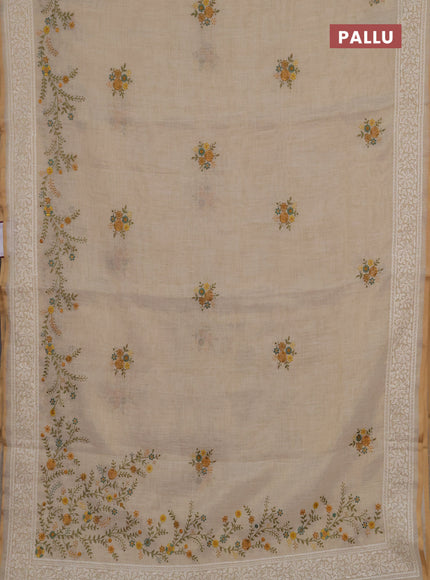 Linen cotton saree cream and yellow with embroidery buttas and embroidery border