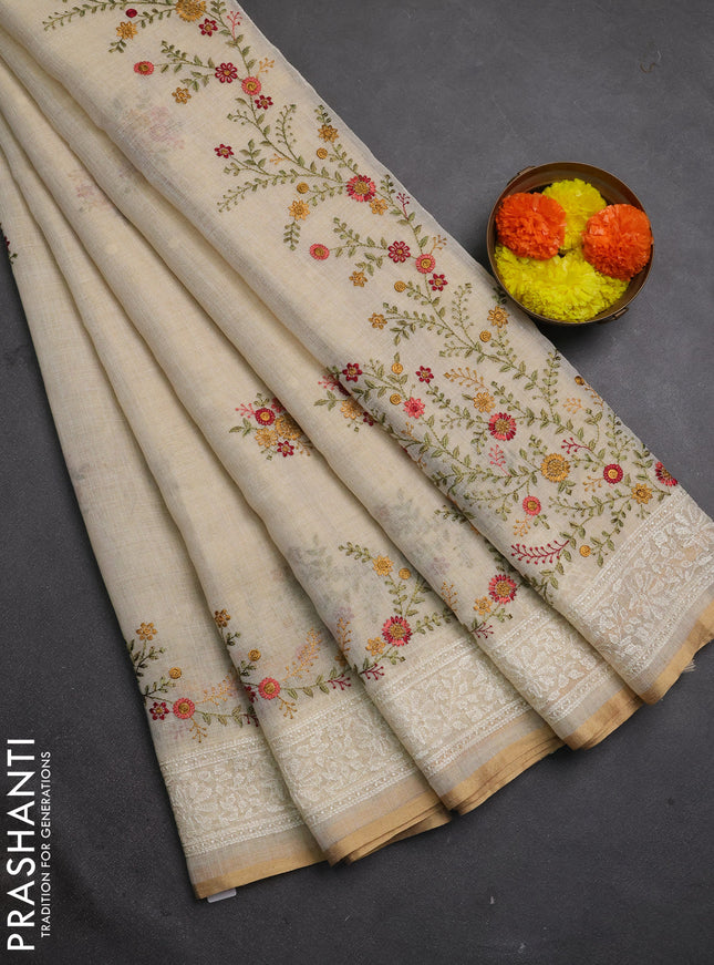 Linen cotton saree cream with embroidery buttas and embroidery border