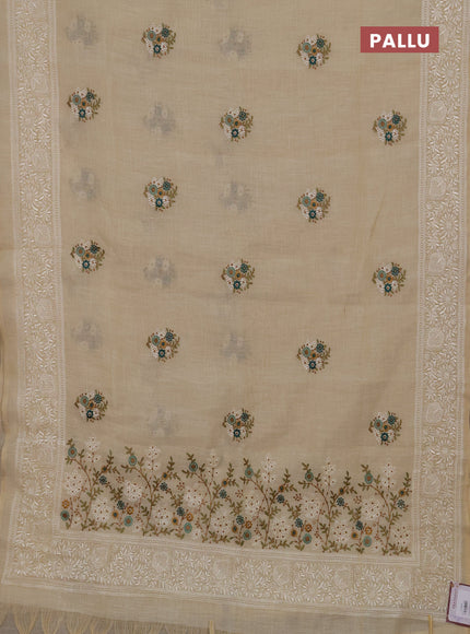 Linen cotton saree cream and peacock green with allover embroidery buttas and embroidery pallu