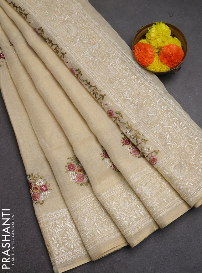Linen cotton saree magenta pink with allover embroidery buttas and embroidery pallu