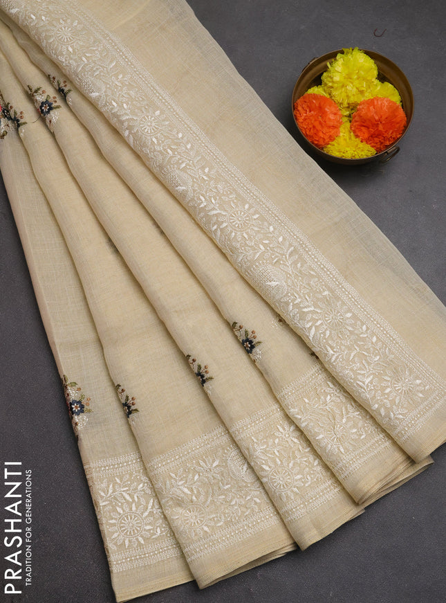 Linen cotton saree dark grey with allover embroidery buttas and embroidery pallu